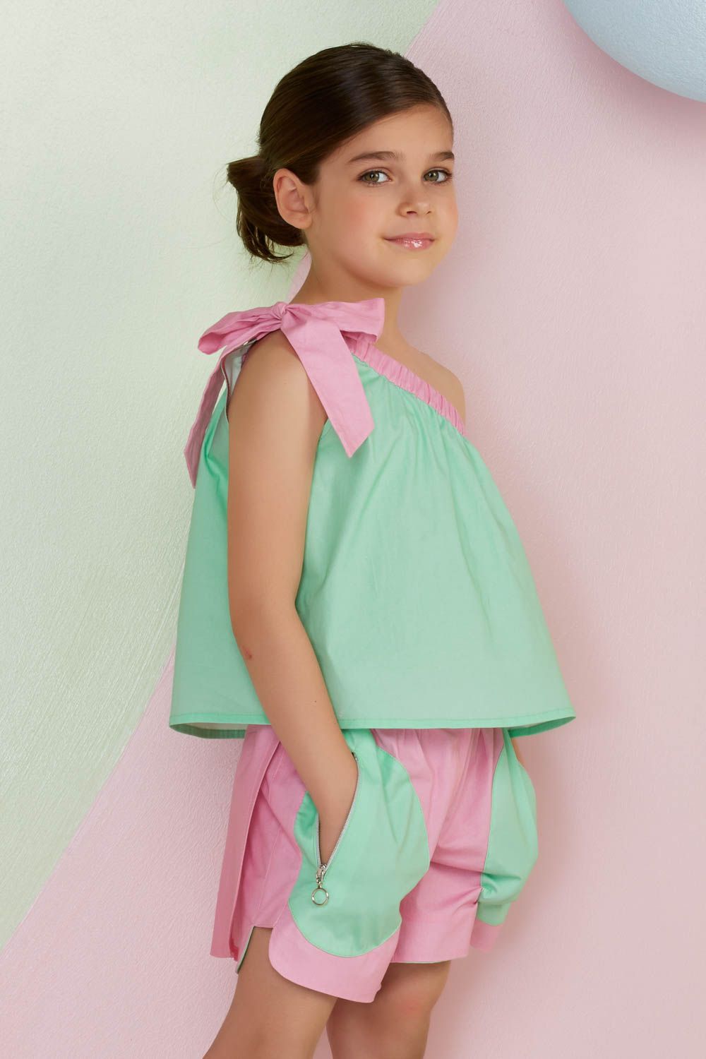 Maglietta ValMax monospalla con maxi fiocco da bambina CLO